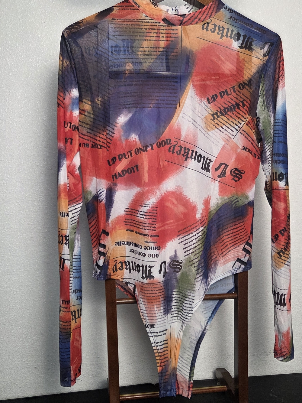 Abstract Newspaper Print Long Sleeve Bodysuit in Multicolor